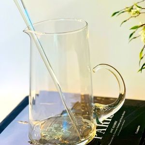 Vintage glass pitcher with glass stir